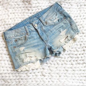 womens denim shorts with pockets showing